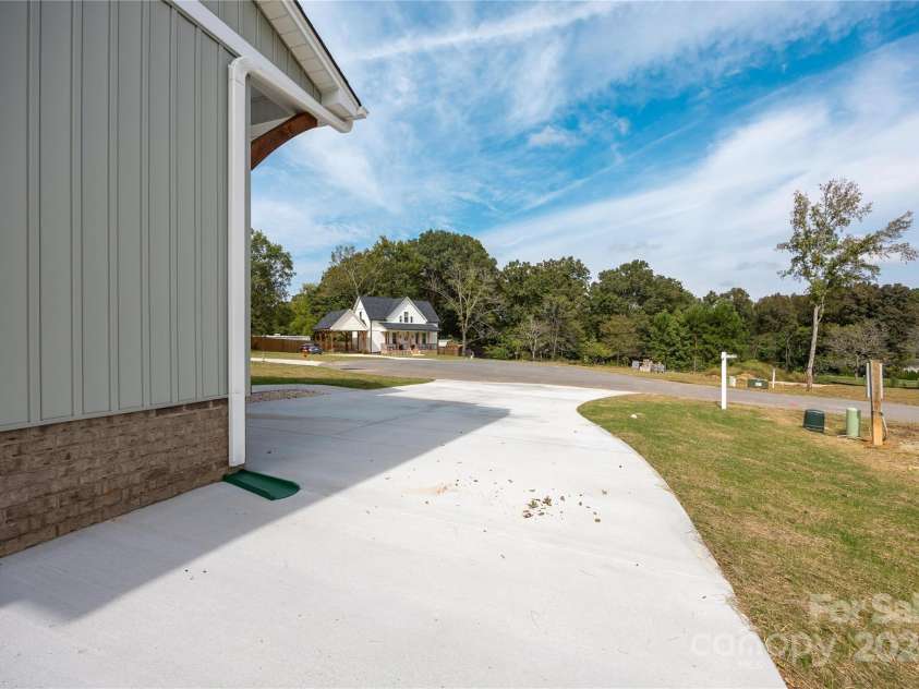 133 Kinney Avenue, Denton, NC 27239.  MLS# CAR4189416, YatesRealty ID 3611. Extra parking beside of garage