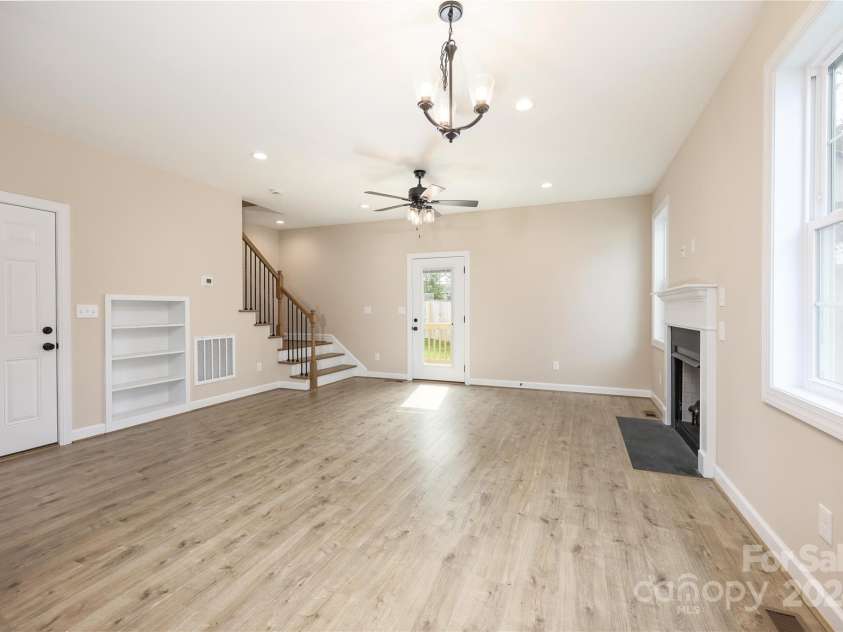 133 Kinney Avenue, Denton, NC 27239.  MLS# CAR4189416, YatesRealty ID 3611. Living room with gas logs