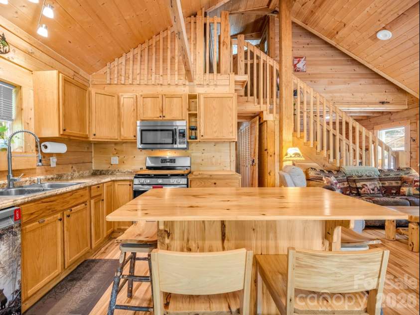 180 Mountain Ridge Drive, Lake Lure, NC 28746.  MLS# CAR4399742, YatesRealty ID 36112. 