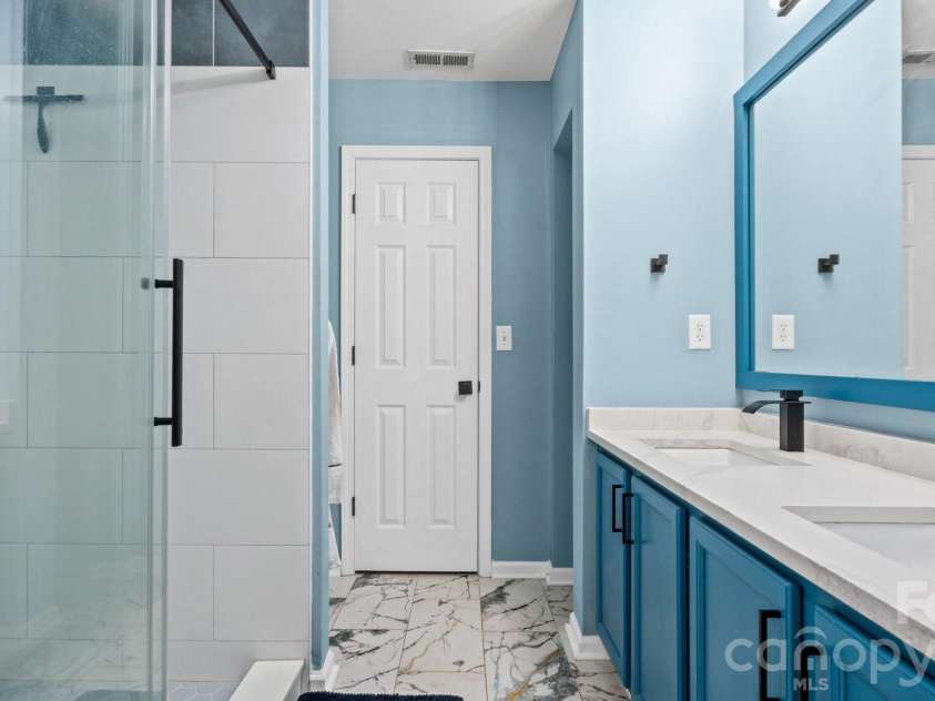 5050 Gibbons Link Road, Charlotte, NC 28269.  MLS# CAR4395941, YatesRealty ID 36113. Double Sink Vanity Primary Bathroom