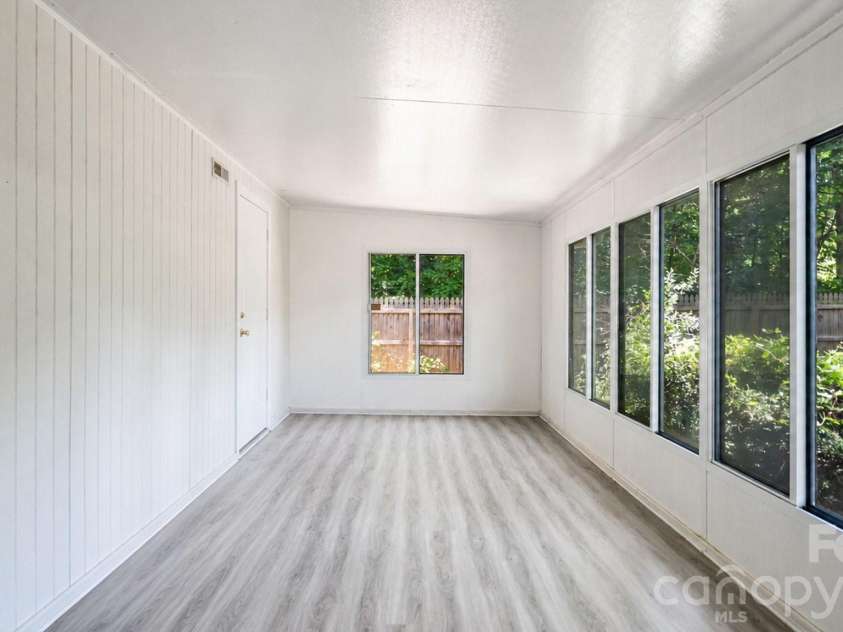 5050 Gibbons Link Road, Charlotte, NC 28269.  MLS# CAR4395941, YatesRealty ID 36113. Sunroom Space With Endless Possibilities