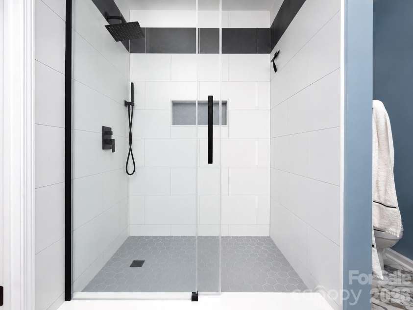 5050 Gibbons Link Road, Charlotte, NC 28269.  MLS# CAR4395941, YatesRealty ID 36113. Updated Tile Shower Primary Bathroom
