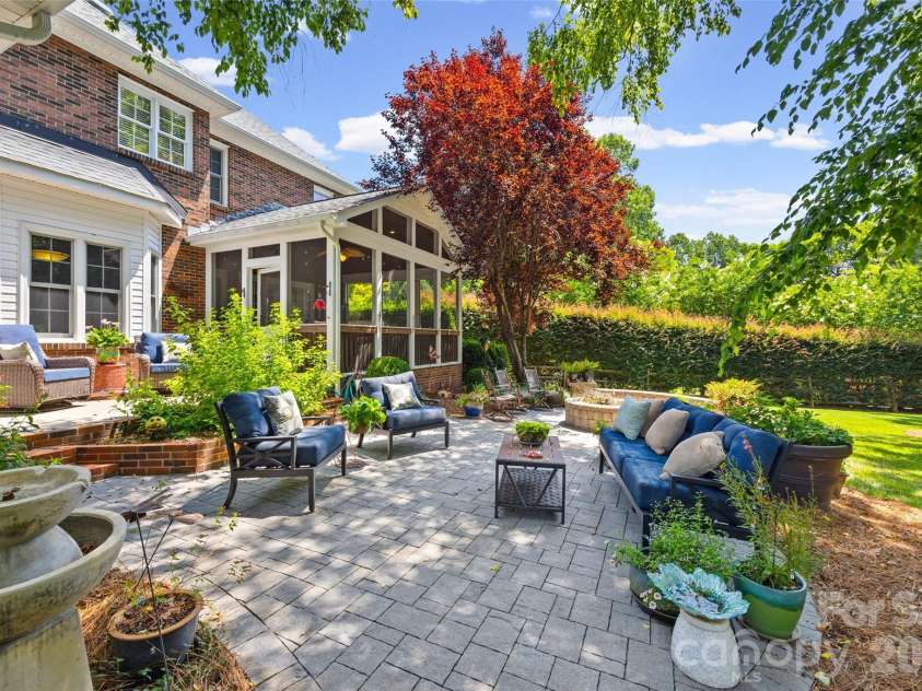 5301 Ravenglass Court, Waxhaw, NC 28173.  MLS# CAR4400032, YatesRealty ID 36114. Beautiful landscaping fills this back yard