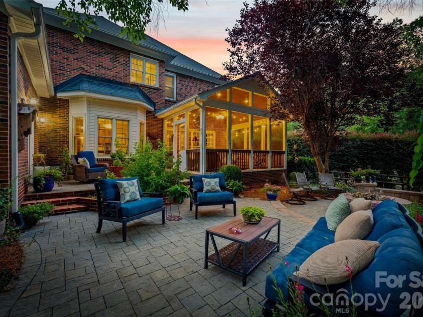 5301 Ravenglass Court, Waxhaw, NC 28173.  MLS# CAR4400032, YatesRealty ID 36114. Paver Patio with sitting area a firepit space.