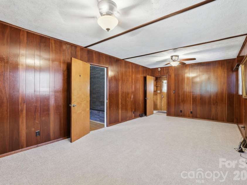 4020 Wilson Lane, Charlotte, NC 28206.  MLS# CAR4402474, YatesRealty ID 36116. Den with Newer Carpet