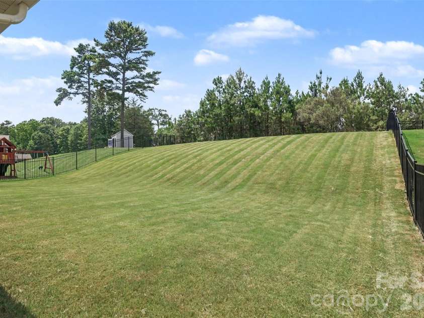 4571 Selhurst Drive, Fort Mill, SC 29707.  MLS# CAR4401865, YatesRealty ID 36119. Backyard