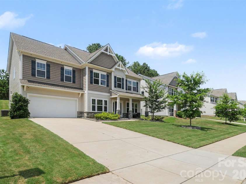 4571 Selhurst Drive, Fort Mill, SC 29707.  MLS# CAR4401865, YatesRealty ID 36119. Front yard - 2 Car Garage