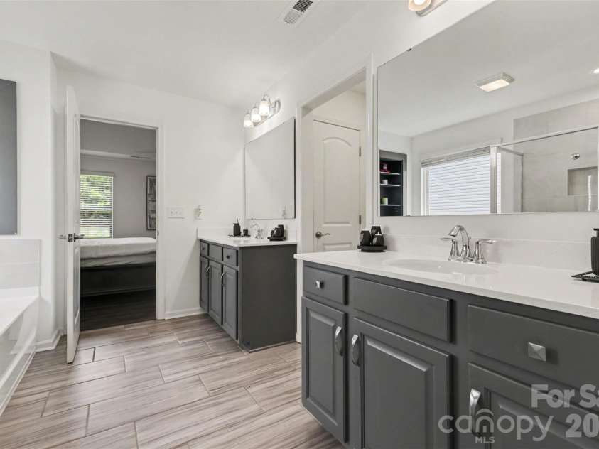 4571 Selhurst Drive, Fort Mill, SC 29707.  MLS# CAR4401865, YatesRealty ID 36119. Primary bathroom