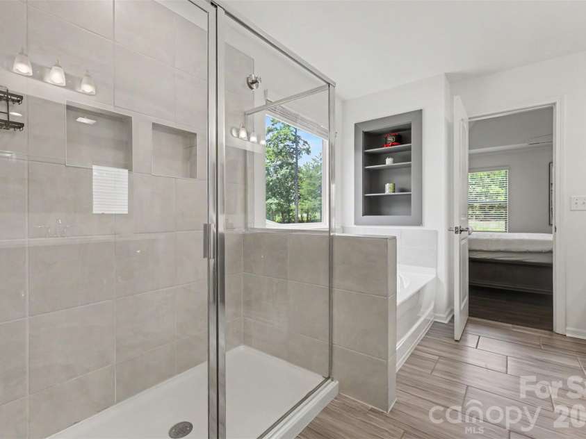 4571 Selhurst Drive, Fort Mill, SC 29707.  MLS# CAR4401865, YatesRealty ID 36119. Primary bathroom shower