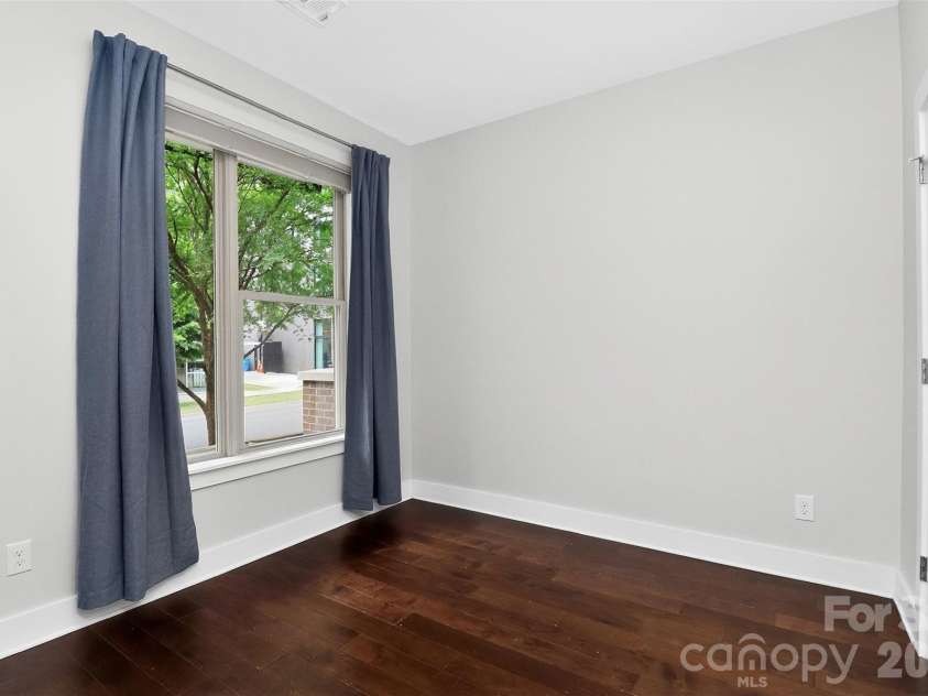231 Doggett Street, Charlotte, NC 28203.  MLS# CAR4380904, YatesRealty ID 36121. First floor bedroom