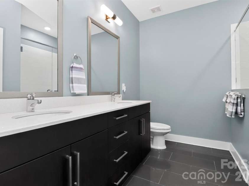 231 Doggett Street, Charlotte, NC 28203.  MLS# CAR4380904, YatesRealty ID 36121. Primary bathroom
