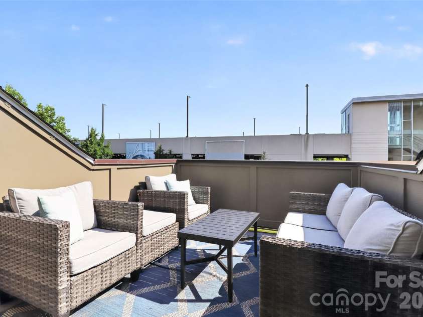 231 Doggett Street, Charlotte, NC 28203.  MLS# CAR4380904, YatesRealty ID 36121. Rooftop