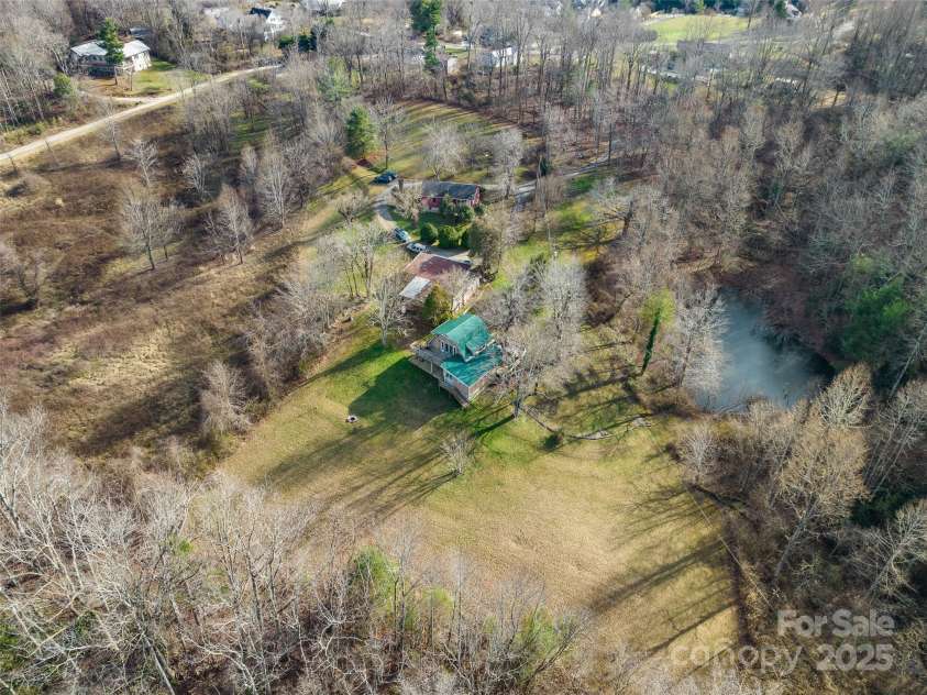 255 & 257 Crescent Street, Saluda, NC 28773.  MLS# CAR4218749, YatesRealty ID 3613. Over 8.5 Acres with 2 parcels, 2 homes adjoining the City of Saluda but in Polk County.
