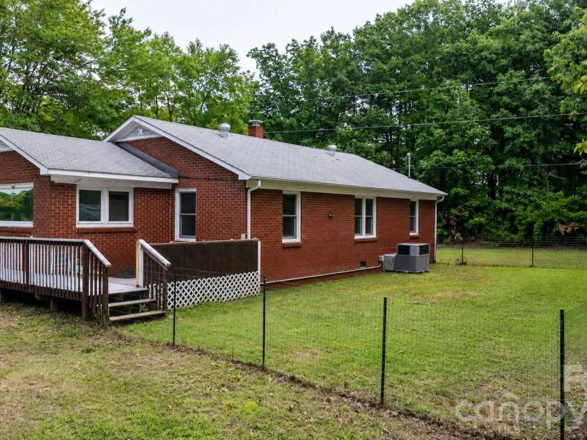 2981 East Maiden Road, Maiden, NC 28650.  MLS# CAR4400803, YatesRealty ID 36143. Backyard. Virtually staged