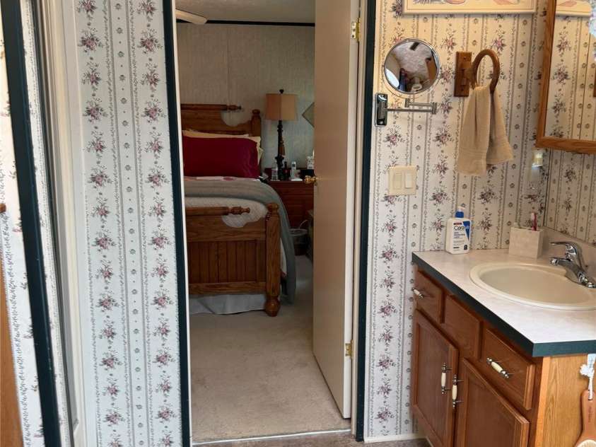 556 Gilbert Road, Columbus, NC 28722.  MLS# CAR4402949, YatesRealty ID 36145. Primary En-suite Bath