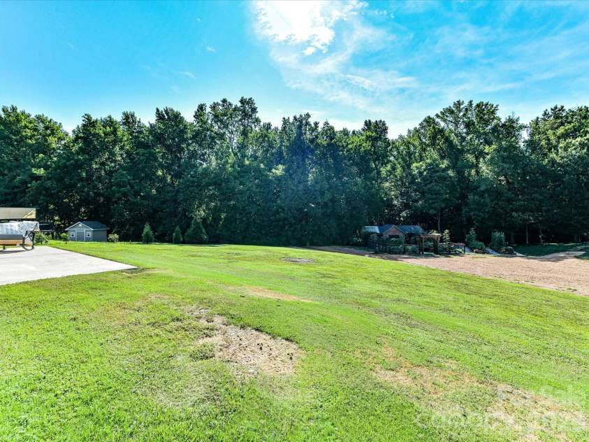 5912 Sikes Mill Road, Monroe, NC 28110.  MLS# CAR4402953, YatesRealty ID 36146. 
