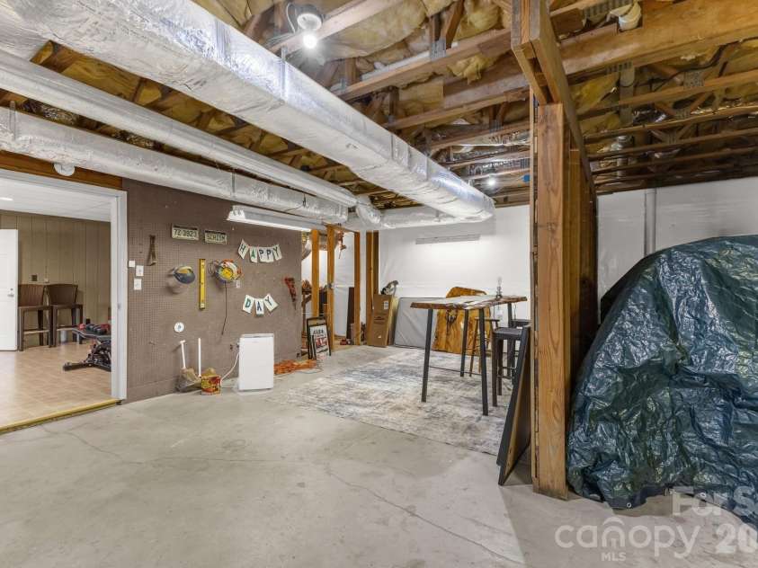 11 Poplar Drive, Mills River, NC 28759.  MLS# CAR4333561, YatesRealty ID 3615. Expansive workspace and storage