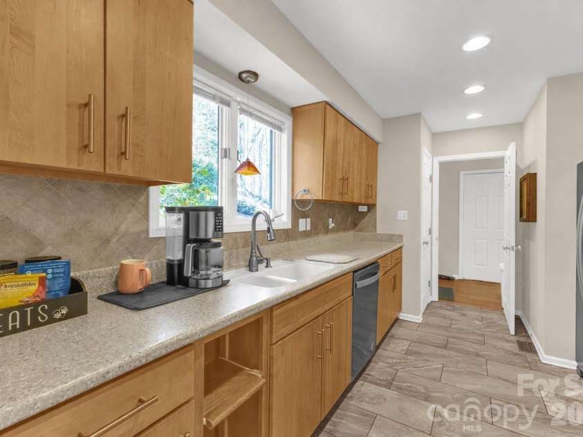 11 Poplar Drive, Mills River, NC 28759.  MLS# CAR4333561, YatesRealty ID 3615. Galley kitchen with modern accents