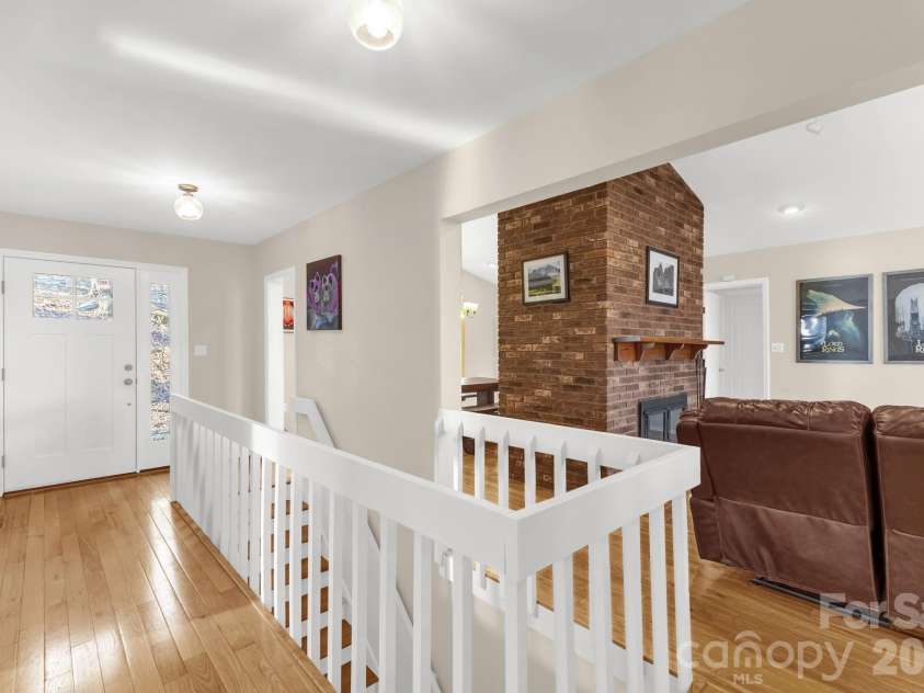 11 Poplar Drive, Mills River, NC 28759.  MLS# CAR4333561, YatesRealty ID 3615. Main entrance opens into a bright, open space