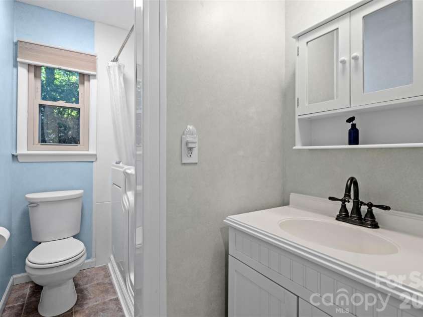 55 Overlook Drive, Candler, NC 28715.  MLS# CAR4403012, YatesRealty ID 36153. Main level bathroom