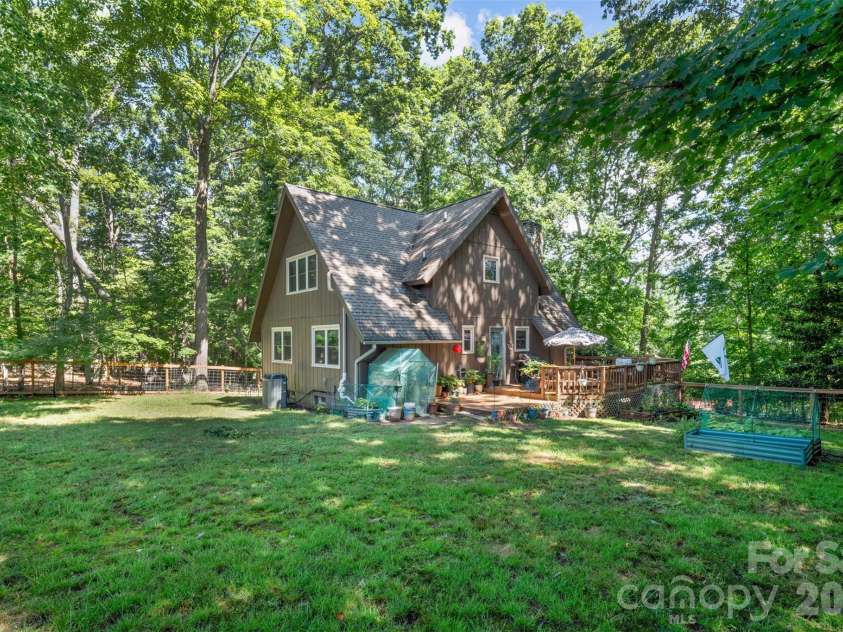 55 Overlook Drive, Candler, NC 28715.  MLS# CAR4403012, YatesRealty ID 36153. Massive fenced in backyard.