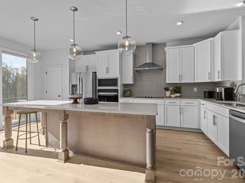 3011 Pointe Town Drive, Charlotte, NC 28208.  MLS# CAR4403013, YatesRealty ID 36154. Kitchen-Representation picture-not actual home