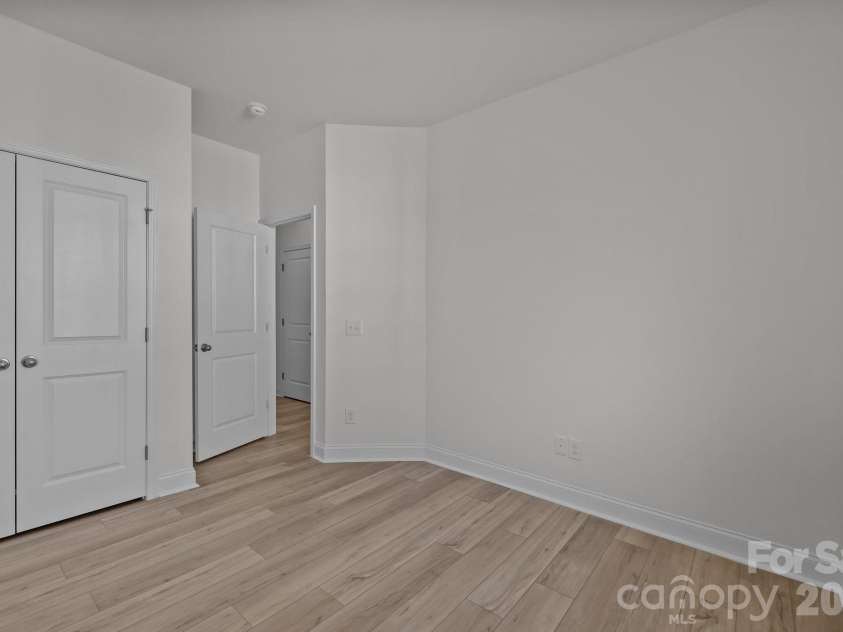 3011 Pointe Town Drive, Charlotte, NC 28208.  MLS# CAR4403013, YatesRealty ID 36154. Main Floor BedroomRepresentative Photo