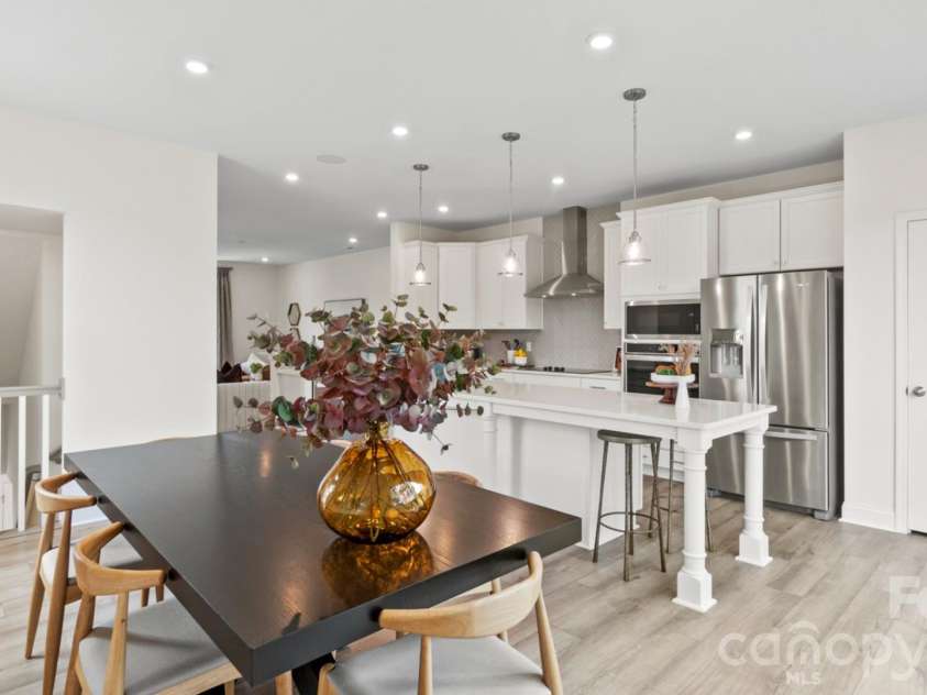 3011 Pointe Town Drive, Charlotte, NC 28208.  MLS# CAR4403013, YatesRealty ID 36154. Representative Photo Kitchen and Dining Area