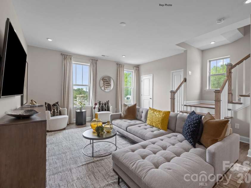 3011 Pointe Town Drive, Charlotte, NC 28208.  MLS# CAR4403013, YatesRealty ID 36154. Representative Photo Living Room