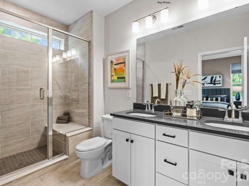 3011 Pointe Town Drive, Charlotte, NC 28208.  MLS# CAR4403013, YatesRealty ID 36154. Representative Photo Primary Bathroom