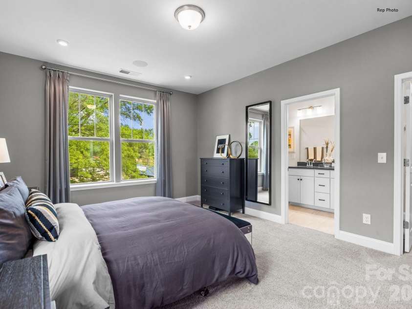3011 Pointe Town Drive, Charlotte, NC 28208.  MLS# CAR4403013, YatesRealty ID 36154. Representative Photo Primary Bedroom