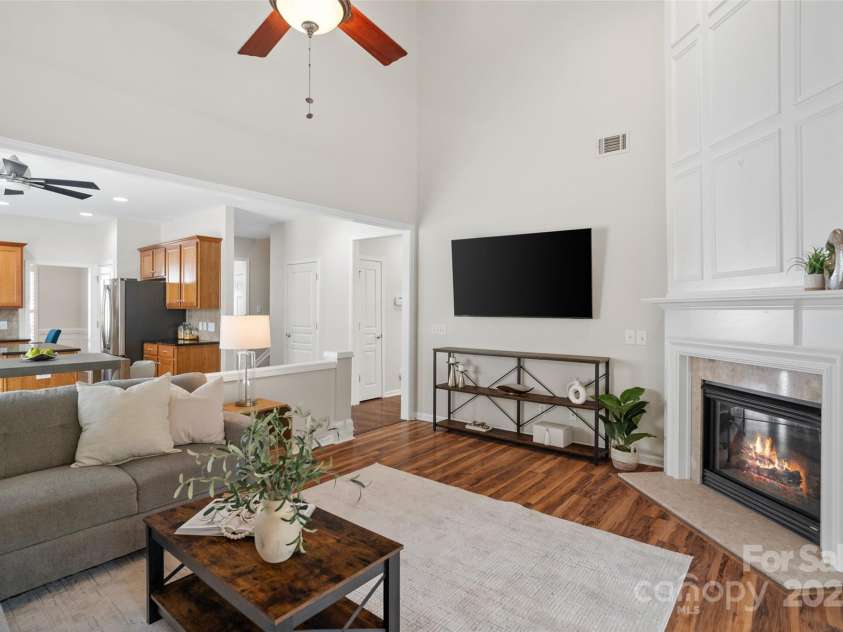 10471 Scotland Avenue, Fort Mill, SC 29707.  MLS# CAR4302938, YatesRealty ID 36158. Living Room and Fireplace