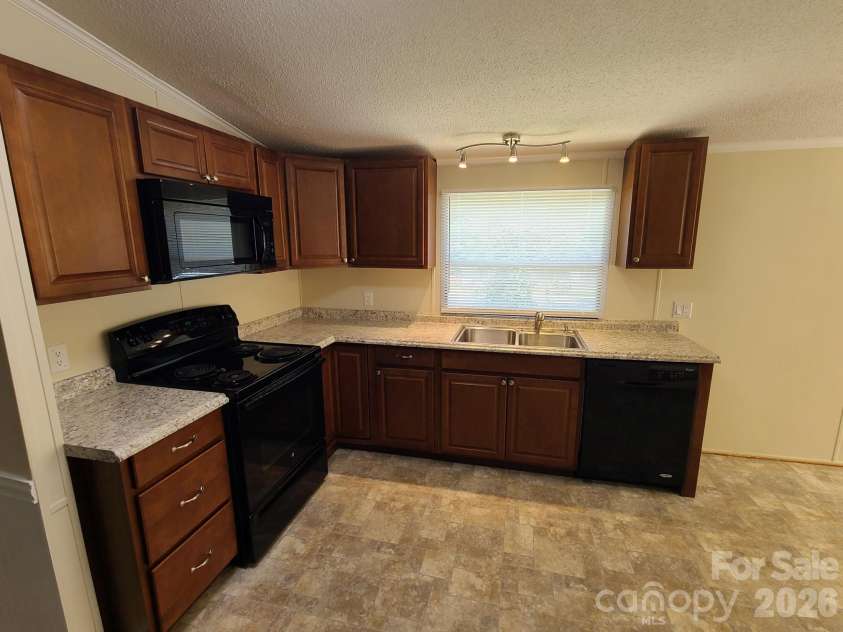 3111 Redbud Place, Lenoir, NC 28645.  MLS# CAR4401731, YatesRealty ID 36159. KITCHEN