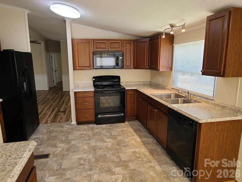 3111 Redbud Place, Lenoir, NC 28645.  MLS# CAR4401731, YatesRealty ID 36159. KITCHEN