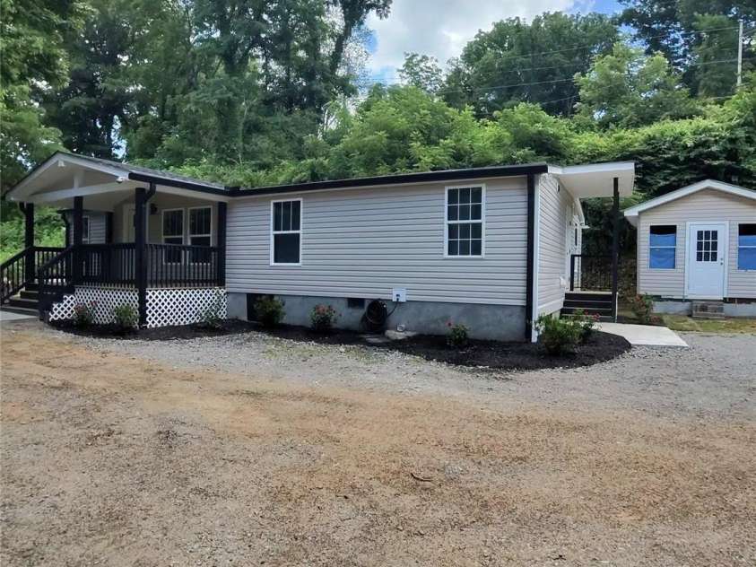 64 P J Drive, Waynesville, NC 28786.  MLS# CAR4402997, YatesRealty ID 36160. Front Right Side
