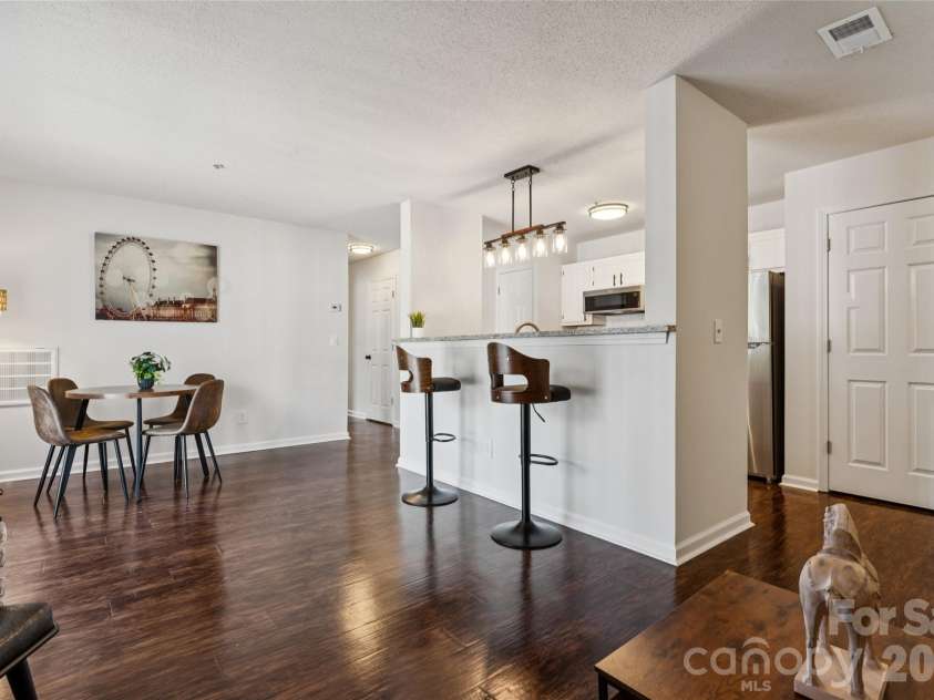 1620 Arlyn Circle, Charlotte, NC 28213.  MLS# CAR4400699, YatesRealty ID 36164. Experience the open concept living area, where the layout flows seamlessly into dining room and modern kitchen space. This thoughtfully designed floor plan creates an inviting atmosphere perfect for hosting large gatheri