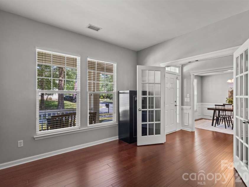 13406 Centennial Commons Parkway, Huntersville, NC 28078.  MLS# CAR4399839, YatesRealty ID 36168. Main level home office with French doors.