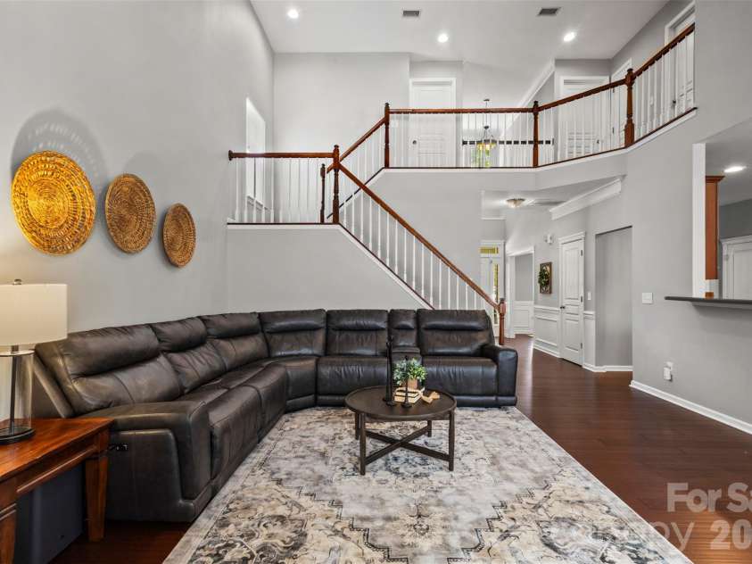13406 Centennial Commons Parkway, Huntersville, NC 28078.  MLS# CAR4399839, YatesRealty ID 36168. The dramatic stairway makes a statement!