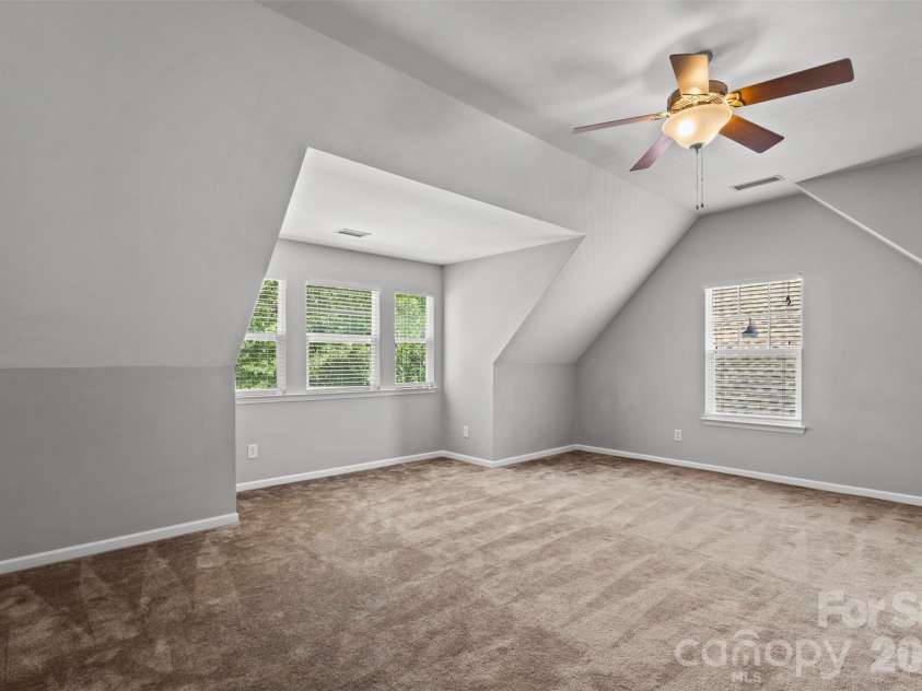 13406 Centennial Commons Parkway, Huntersville, NC 28078.  MLS# CAR4399839, YatesRealty ID 36168. Upper level bonus room after the garage.