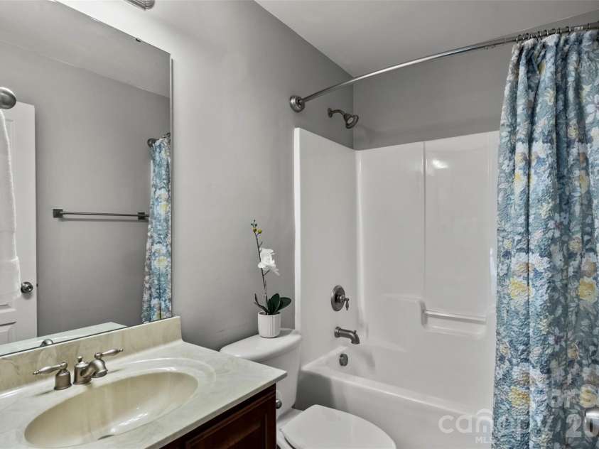 13406 Centennial Commons Parkway, Huntersville, NC 28078.  MLS# CAR4399839, YatesRealty ID 36168. Upper level guest bath.