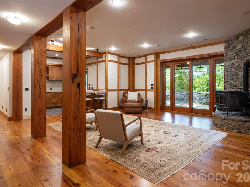 4900 Preserve Road, Sylva, NC 28779.  MLS# CAR4393548, YatesRealty ID 36172. Lower level living room