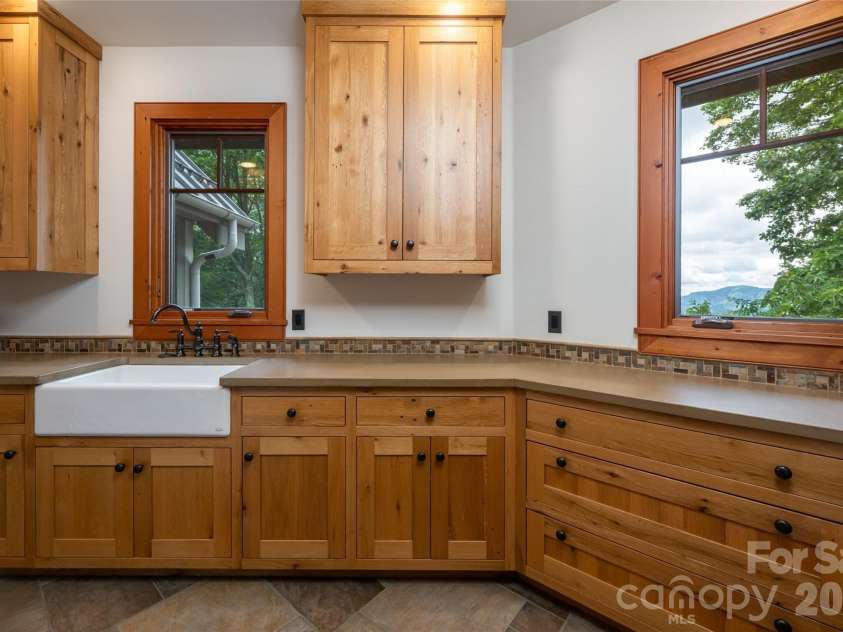 4900 Preserve Road, Sylva, NC 28779.  MLS# CAR4393548, YatesRealty ID 36172. Main level laundry