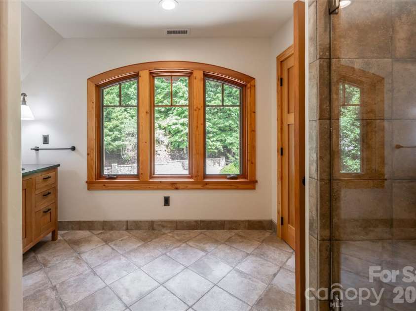 4900 Preserve Road, Sylva, NC 28779.  MLS# CAR4393548, YatesRealty ID 36172. Over garage adu/private guest suite full bath