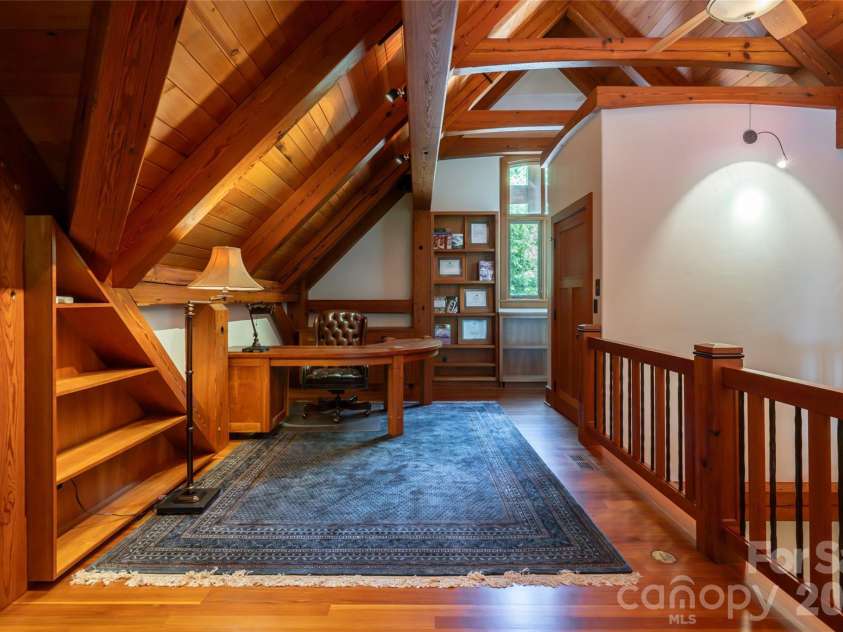 4900 Preserve Road, Sylva, NC 28779.  MLS# CAR4393548, YatesRealty ID 36172. Spacious upper level loft with built in desk
