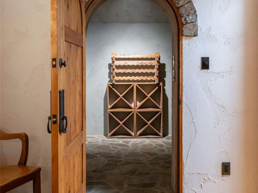 4900 Preserve Road, Sylva, NC 28779.  MLS# CAR4393548, YatesRealty ID 36172. Wine cellar