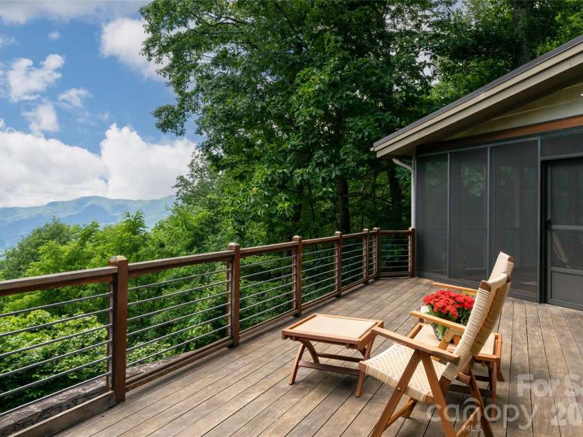 4900 Preserve Road, Sylva, NC 28779.  MLS# CAR4393548, YatesRealty ID 36172. Year round views and selectively positioned foliage allow for the perfect blend of open yet private