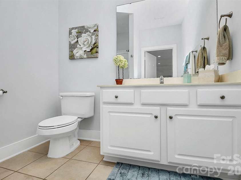 748 Cotton Gin Alley, Davidson, NC 28036.  MLS# CAR4402727, YatesRealty ID 36173. Hall bathroom