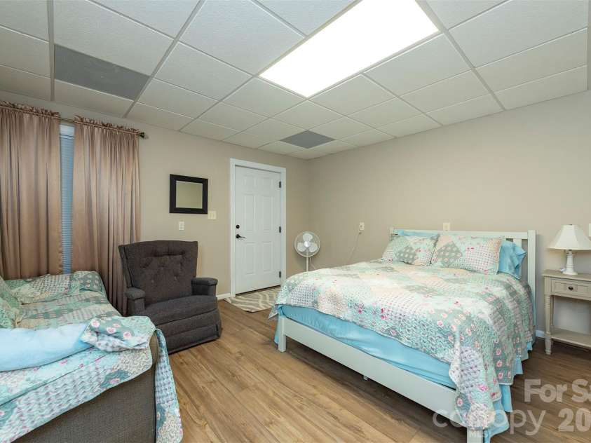 301 Oak Winds Drive, Old Fort, NC 28762.  MLS# CAR4399378, YatesRealty ID 36175. Bonus room in lower level 4