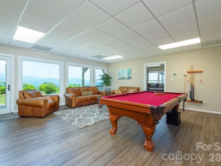 301 Oak Winds Drive, Old Fort, NC 28762.  MLS# CAR4399378, YatesRealty ID 36175. Entertainment room