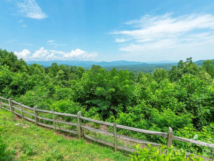 301 Oak Winds Drive, Old Fort, NC 28762.  MLS# CAR4399378, YatesRealty ID 36175. Fully fenced back yard
